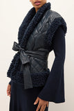Marie Oliver Clothing BEATRICE VEST Style 855-306B-108 in Naval Blue; Quilted Vegan Leather Vest; Navy Blue Sherpa Trim Belted Fall/Winter Vest