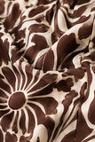 ASTR the Label Eva Pant Style ACP7429 in Brown Tropical. Close-up of the lightweight woven botanical print fabric showing the rich brown and ivory color palette and soft drape.