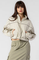 Beige Botany Clothing Cropped Windbreaker Jacket Style A2577J in Mist and Charcoal; cropped windbreaker;Women's active style windbreaker