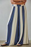 By Together Clothing Havana Pants Style L9564B in Navy Cream. Women's viscose blend, navy and white vertical stripe flowy wide leg pant