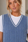 Close-up of blue cable-knit V-neck sweater vest with ivory trim and built-in white tee layer. Central Park West Clothing Coen Cable X CNS Layered Sweater Style CF26-10681K in Denim White; 