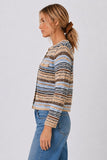 Central Park West Clothing Marlon Textured Stitch Cardigan Style CU26-10625S in Brown Blue Multi; Woman wearing the Marlon textured striped button-front cardigan with blue jeans.