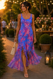 Blue floral maxi dress in motion showing the flowing sheer mesh hem and cascading ruffle slits. Deborah Viereck Victory Dress in Max Mesh