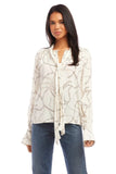 Fifteen Twenty tie neck top in ivory chain link print Italian crepe fabric, featuring soft tie at V-neck and billowy blouson sleeves for an elegant and modern look. Style Number 3F30548 Prt