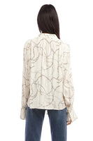 Fifteen Twenty tie neck top in ivory chain link print Italian crepe fabric, featuring soft tie at V-neck and billowy blouson sleeves for an elegant and modern look. Style Number 3F30548 Prt