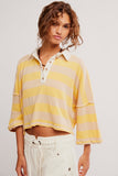 Free People Clothing Auggie Tee Style OB2522317 in Oat Latte Yellow Finch. Women's Cotton striped slouchy polo style pullover spring summer top.