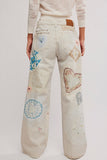 Free People We The Free Tinsley Printed Jeans Style OB2438693 in Heirloom Ivory; Screen-Printed heart patchwork jeans, spring jeans, straight leg printed patchwork jeans