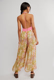 Free People Clothing Ultraviolet Haze Jumpsuit Style OB2516819 in Blush Meadow Combo. Flowy Wide Leg, Smocked Multi-color Floral, Halter Neck, open back, Spring and Summer Jumpsuit.