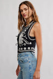Free People Clothing Deep Trance Shine Embroidered Dropped Boyfriend Jeans Style OB2361397 in Starry Night; Free People Clothing Under the Sun Vest Style OB2405796 in Black; Embroidered Tie Front Vest Top; 