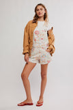 Free People Ziggy Printed shortalls Style OB1812086 in sun drenched combo. White floral printed cotton denim shorts overalls. Floral Printed Denim shortalls