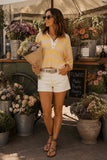 Free People Clothing Auggie Tee Style OB2522317 in Oat Latte Yellow Finch. Women's Cotton striped slouchy polo style pullover spring summer top.