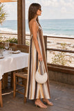 Greylin Clothing Stella Vertical Watercolor Maxi Dress Style G266D7133 in Mustard Brown Neutral Stripe. Profile view of the Stella Watercolor Maxi Dress showing its silhouette