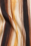 Greylin Clothing Stella Vertical Watercolor Maxi Dress Style G266D7133 in Mustard Brown Neutral Stripe. Close-up of the fabric and print on the Stella Watercolor Maxi Dress