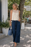 Greylin Clothing Alice Sheer Embroidered Sleeveless Top Style G266T7581 in Ivory; Woman wearing Alice ivory sheer embroidered sleeveless top with dark wide-leg jeans for Hudson Valley brunch