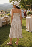 what to wear to a summer garden party, dress for a vineyard wedding, comfortable dress for outdoor events, flattering midi dress, lightweight dress for hot weather, dress for wine tasting, dress that can be dressed up or down, elegant casual summer dress