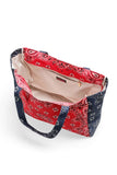 Haute Shore Bailey Red/Navy Bandana Tote bag. Red and Navy lined Canvas Bandana toe bag with an interior and exterior zipper pocket and a zip closure.  Bfree American Summer