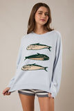 Le Lis Clothing Sardine Sweater Top Style SWT3466 in baby blue. Baby Blue Cotton blend relaxed fit Spring crew neck sweater with sardines graphic.