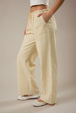 Le Lis Collection Low Rise Wide Leg Striped Cotton Woven Pant Style SP3372 in White Yellow Stripe. Women's all cotton woven striped low rise tie waist wide leg spring summer pant.