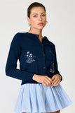 Line and Dot clothing Mooring Cardigan Style LT6081L in Navy; 100% Cotton Mid Weight knit fabric cardigan with round neck line button front and coastal mooring embroidered details