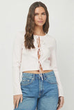 Needii Clothing Tie Front Sweater Style 1704NT in Baby Pink;  Light weight Baby Pink Scalloped Hem Tie Front Knit Cardigan Layer