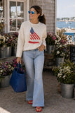 Pink Pineapple Chloe Flag Sailboat Roll Neck Sweater in Cream. Women's cotton light weight rollneck flag sailboat beachy summer sweater