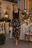 Rails Clothing Akira Top Style 229-615C-001 in black; Rails Akira black linen top styled with printed maxi skirt and clear heel sandals for dinner