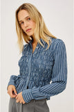 Rails Clothing Bradshaw Skirt Style 201084-521B-12126 in Washed Indigo Stripe. Timeless Button Up Top. Smocked Peplum Bottom Button Down Top to par with high waisted bottoms.