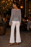Back view of the Evangeline ivory and navy striped open-weave sweater showing the relaxed fit and boat neckline. Rails Evangeline Sweater Style 826D-350D-8756 in Ivory Indigo Stripe.
