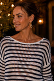 Close-up of the Evangeline sweater boat neckline and open-weave linen blend knit in ivory and dark navy stripes. Rails Evangeline Sweater Style 826D-350D-8756 in Ivory Indigo Stripe.