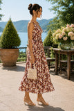 Side view of a floral midi dress highlighting the flattering empire waist, V-neckline, and softly draped silhouette. Rails Clothing Marciana Dress Style 913A-191G-8768 in Cardinal Floral