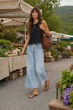 Rails Clothing The Boxy Tank Style 813-383A-001 in Black.  Woman styling the black Boxy Tank with high-rise bottoms for an effortless contemporary boutique outfit.