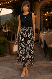 Rails Clothing The Boxy Tank Style 813-383A-001 in Black.  Woman wearing the Boxy Tank in Black with a printed midi skirt for an elevated casual outfit.