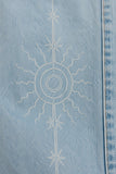 Light-wash denim texture and subtle soleil laser design on Rails Angeleno jeans.