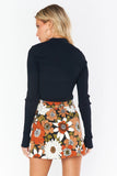 Show ME Your Mumu Tyra Belted Skirt Style MDF3-655 HF07 in Hutton Floral Corduroy;Show Me Your Mumu Tyra Belted Corduroy Skirt, retro modern floral print, fall colors, corduroy texture, belted design, autumnal elegance, vintage-inspired, contemporary styling, bold statement.