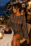 Show Me Your Mumu Drifter Dress Style MM6-6588 RB58 in Sundown Stripe. Amalfi Coast dinner styling featuring the Drifter Mini Dress, gold earrings and black woven clutch
