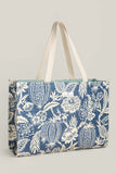 Spartina 449 Market Tote style B10013364 in Flagler Blue. a laminated cotton and linen blend toe bag with durable woven straps.