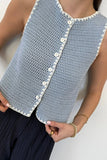 Steve Madden Apparel Annya Sweater Vest Style SB11149 in Blue Ice. Women's 100% Cotton open knit contrast stitch detail button front spring summer sweater vest