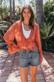 Steve Madden Apparel Montana Knit Top Style SA10430 in Canyon Rose. Semi sheer flower embroidered tie bracelet sleeve V-neck ruffle tiered spring summer top
