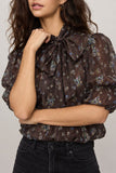 Steve Madden Apparel Lolanie Tie Neck Puff Sleeve Top Style SC09244 in Dark Espresso. Perfect fall top for high waisted jeans