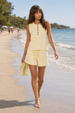 Varley Clothing Atrium High Rise Short 4.5 Style VAR01759 ANIF in Anise Flower Paired With the Marla Button Placket Tank and Archies Flip Flops. Atrium High Rise Shorts styled with a matching button-placket tank during a barefoot beach walk 