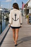 Vintage Havana Yacht Club Cardigan Style B13996 in Coconut. A women's cotton bled open front off white with navy knit cardigan with a bold anchor graphic on back