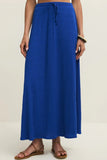 Z Supply Clothing Idris Maxi Skirt Style ZK261346 NAU in Nautical Blue. textured puckered knit maxi skirt with an elastic tie waist and a back slit that adds movement and ease. 