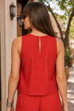 Z Supply Clothing Sloane Linen Cropped Tank Top Style ZT261576 CHP in Chili Pepper. Close-up of the Sloane Linen Cropped Tank showing its buttoned back keyhole, center seam and relaxed shape