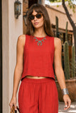 Z Supply Clothing Sloane Linen Cropped Tank Top Style ZT261576 CHP in Chili Pepper. Close-up of the red Sloane Linen Cropped Tank showing its crew neckline, sleeveless shape and relaxed cropped fit