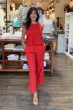 Z Supply Clothing Scout Linen Pant style ZP261545 CHP in Chili Pepper. Woman wearing the red Scout Linen Pant with the matching Sloane Linen Top while shopping in Bfree Warwick, NY