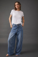 Free People Old West Slouchy Jean Style OB1280913 in Canyon Blue;Wide Leg Denim Jeans;Free People Wide Leg Slouchy Denim Jeans;Raw Hem Slouchy Wide Leg Jeans