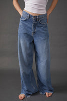 Free People Old West Slouchy Jean Style OB1280913 in Canyon Blue;Wide Leg Denim Jeans;Free People Wide Leg Slouchy Denim Jeans;Raw Hem Slouchy Wide Leg Jeans